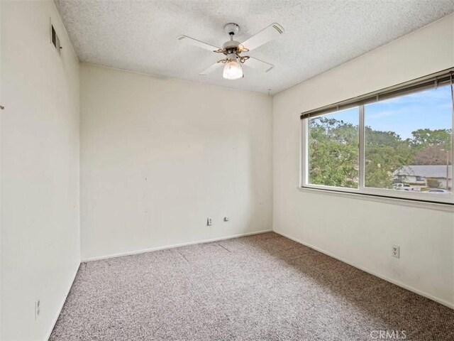 25582 Old Course Way, Valencia, CA 91355 - empty room featuring carpet, ceiling fan, and a textured ceiling