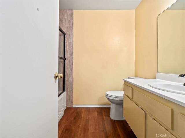 25582 Old Course Way, Valencia, CA 91355 - bathroom featuring vanity, wood finished floors, and shower / bathtub combination