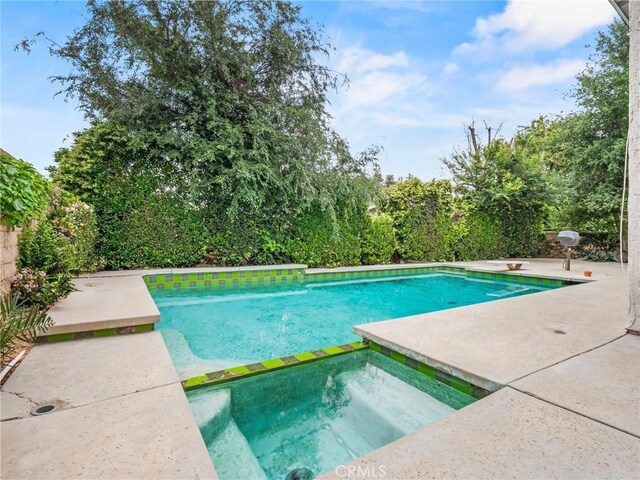 25582 Old Course Way, Valencia, CA 91355 - view of pool featuring a patio area and a pool with connected hot tub