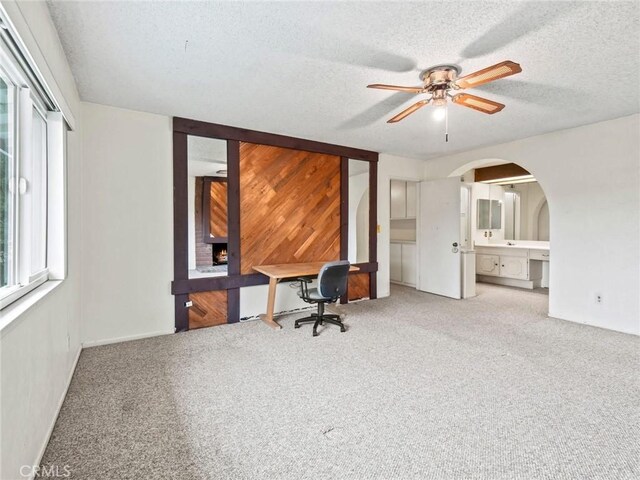 25582 Old Course Way, Valencia, CA 91355 - unfurnished office featuring a ceiling fan, carpet floors, arched walkways, and a textured ceiling