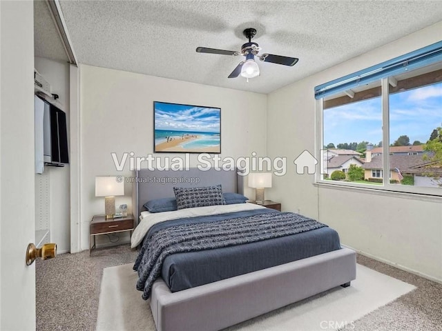 25582 Old Course Way, Valencia, CA 91355 - bedroom with carpet, a textured ceiling, and a ceiling fan