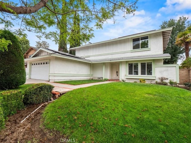 25582 Old Course Way, Valencia, CA 91355 - view of front of property with a garage and solar panels