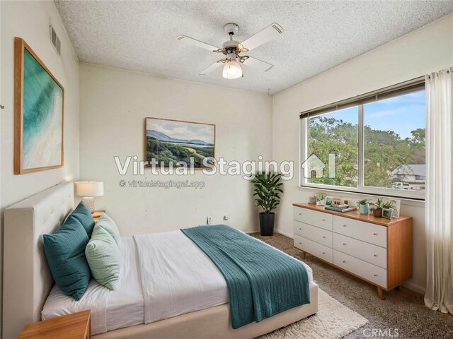 25582 Old Course Way, Valencia, CA 91355 - carpeted bedroom featuring a textured ceiling and ceiling fan