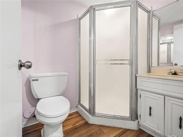 25582 Old Course Way, Valencia, CA 91355 - full bathroom featuring a stall shower, vanity, and wood finished floors