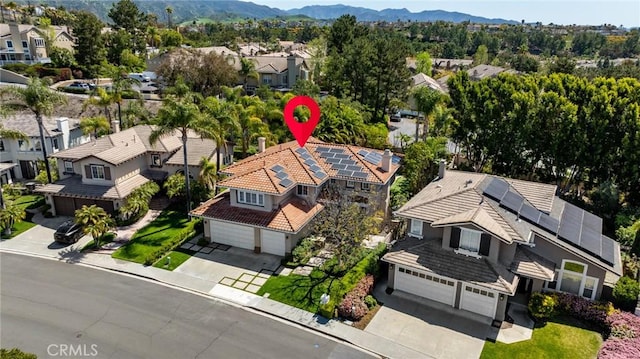 bird's eye view featuring a mountain view and a residential view