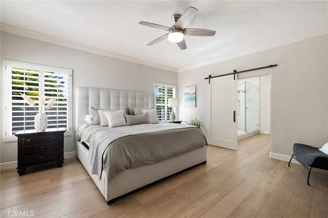 bedroom featuring baseboards, a barn door, ceiling fan, light wood-style floors, and crown molding