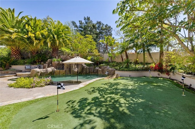 surrounding community featuring a patio area and fence