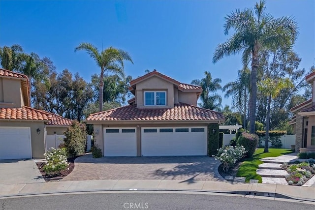 4 Bastia, Laguna Niguel, CA 92677 - mediterranean / spanish house featuring fence, stucco siding, driveway, and a tiled roof
