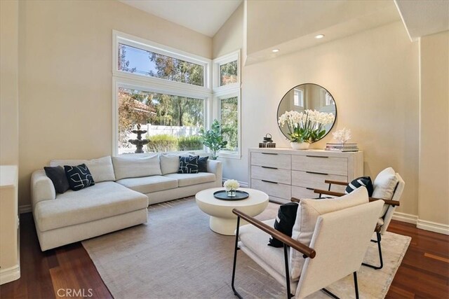 4 Bastia, Laguna Niguel, CA 92677 - sitting room featuring dark wood finished floors, high vaulted ceiling, recessed lighting, and baseboards