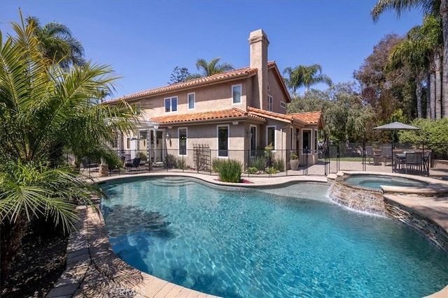 4 Bastia, Laguna Niguel, CA 92677 - view of pool featuring fence, a patio area, and a pool with connected hot tub