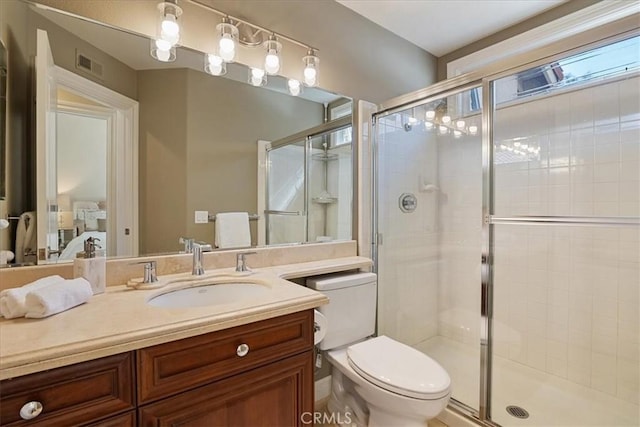 4 Bastia, Laguna Niguel, CA 92677 - bathroom featuring visible vents, a shower stall, toilet, and vanity