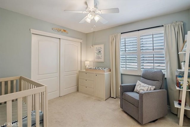 4 Bastia, Laguna Niguel, CA 92677 - bedroom with a crib, ceiling fan, a closet, and light colored carpet