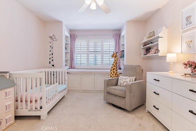 4 Bastia, Laguna Niguel, CA 92677 - bedroom featuring a crib, a ceiling fan, and light carpet