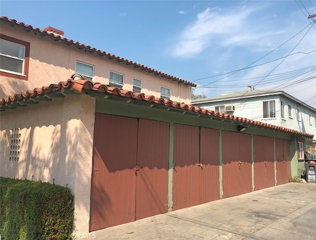 2200 Chestnut, Long Beach, CA 90806 - view of home's exterior with a tiled roof and stucco siding