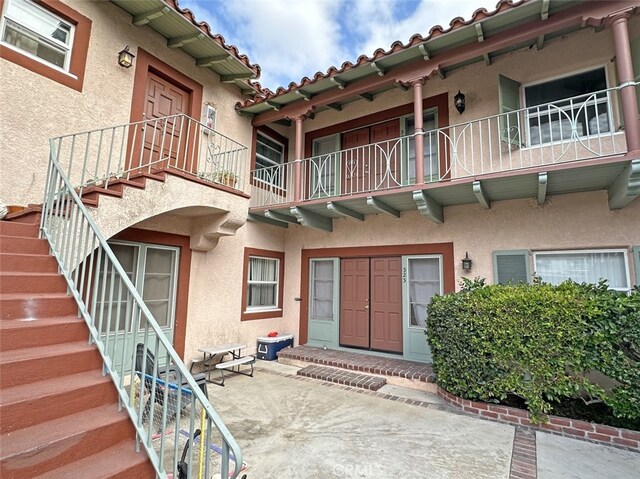 2200 Chestnut, Long Beach, CA 90806 - property entrance with stucco siding and a tiled roof