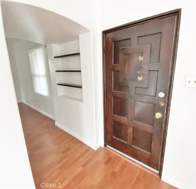 2200 Chestnut, Long Beach, CA 90806 - entryway featuring wood finished floors and arched walkways