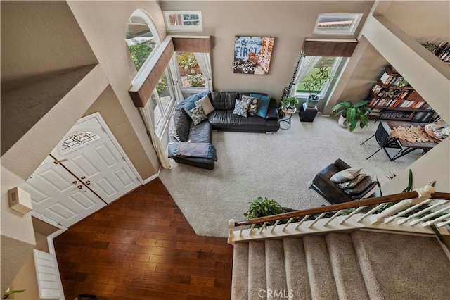 22004 Pamplico Dr, Saugus, CA 91350 - living area featuring wood finished floors and a towering ceiling