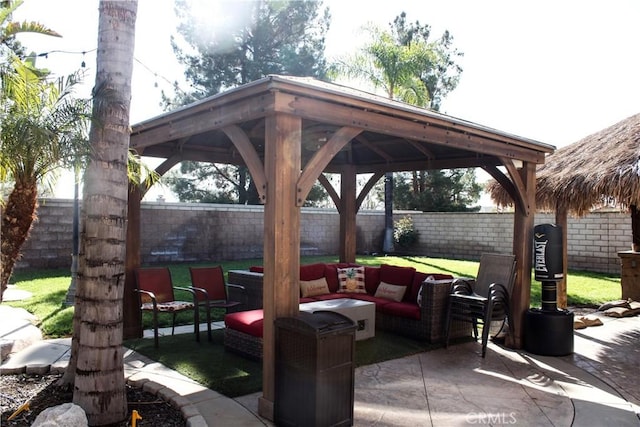 3535 Sunmeadow Cir, Corona, CA 92881 - view of patio with a gazebo, a fenced backyard, and an outdoor living space
