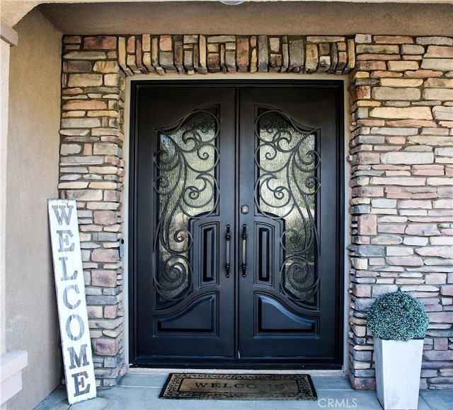 3535 Sunmeadow Cir, Corona, CA 92881 - doorway to property with french doors and brick siding