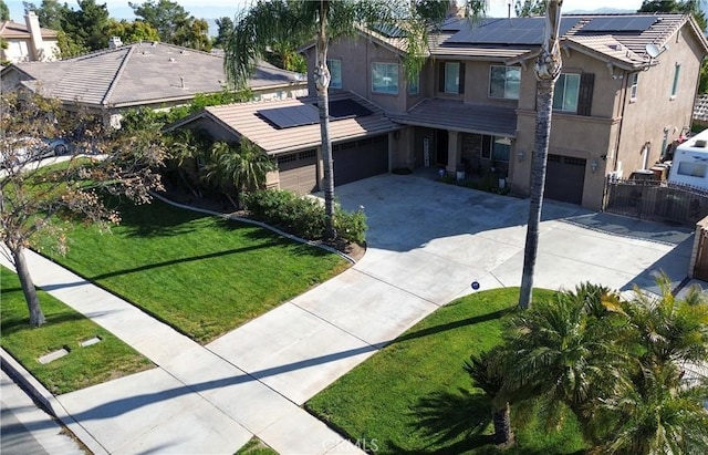 3535 Sunmeadow Cir, Corona, CA 92881 - view of front of home featuring concrete driveway, stucco siding, an attached garage, and solar panels
