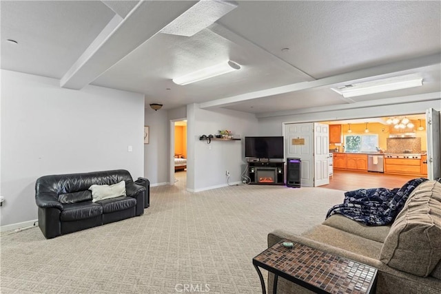 2745 Deer Creek Dr, Running Springs, CA 92382 - living room with light carpet, beamed ceiling, and a textured ceiling