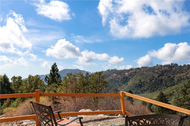 2745 Deer Creek Dr, Running Springs, CA 92382 - wooden terrace with a mountain view
