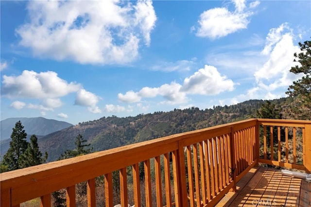 2745 Deer Creek Dr, Running Springs, CA 92382 - wooden terrace with a mountain view