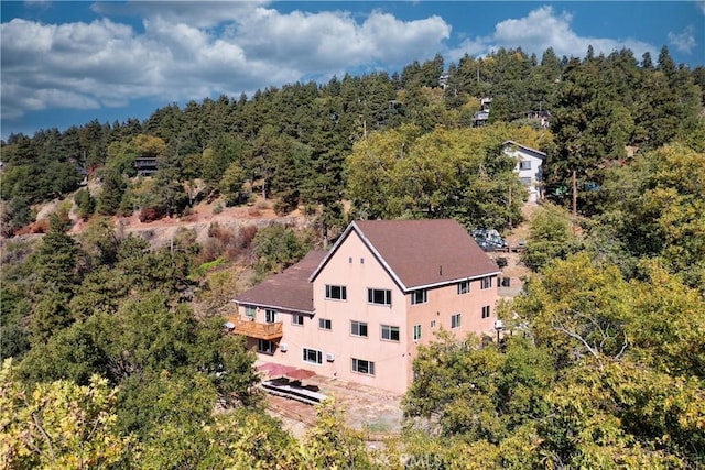 2745 Deer Creek Dr, Running Springs, CA 92382 - aerial view of property and surrounding area with a heavily wooded area
