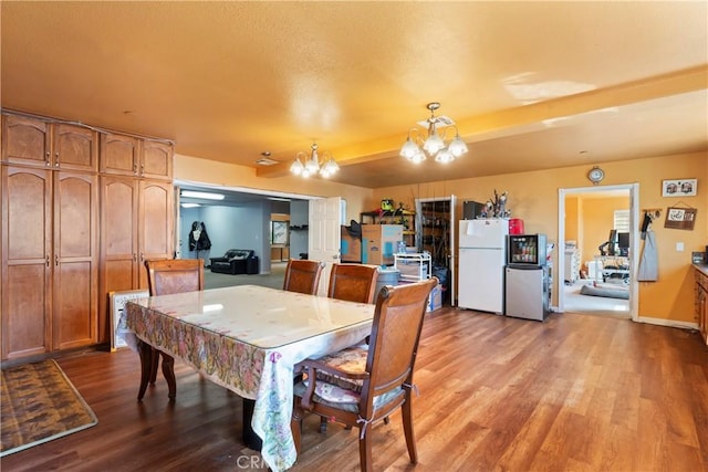 2745 Deer Creek Dr, Running Springs, CA 92382 - dining room with a chandelier and light wood finished floors