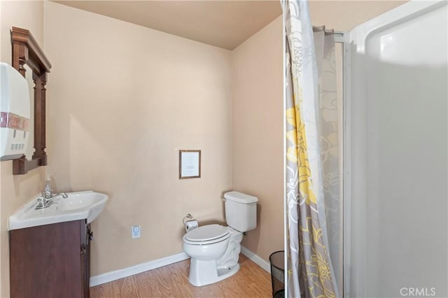 2745 Deer Creek Dr, Running Springs, CA 92382 - bathroom with vanity, wood finished floors, and a shower with curtain