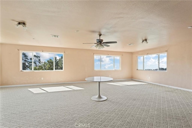 2745 Deer Creek Dr, Running Springs, CA 92382 - unfurnished room with carpet flooring, a textured ceiling, and ceiling fan