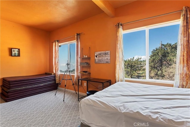 2745 Deer Creek Dr, Running Springs, CA 92382 - carpeted bedroom with beam ceiling and baseboards