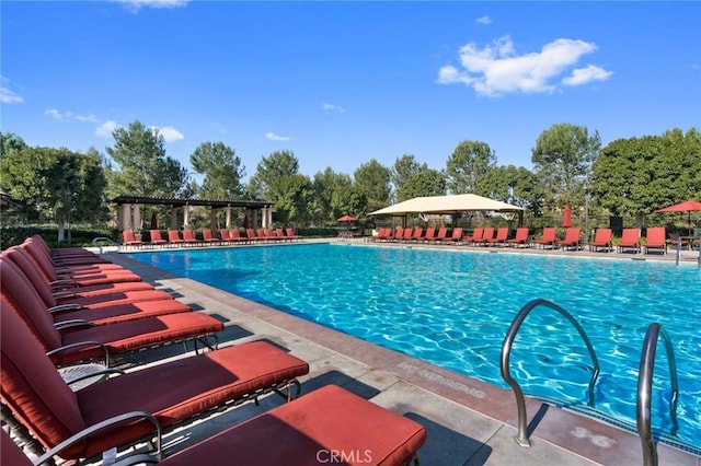 42 Cipresso, Irvine, CA 92618 - community pool with view of wooded area and a patio
