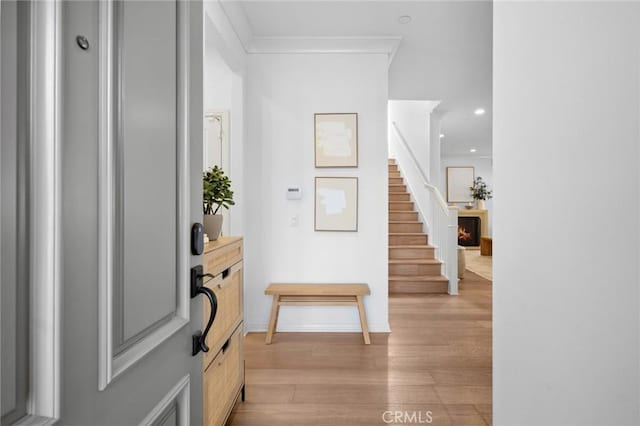 42 Cipresso, Irvine, CA 92618 - foyer featuring light wood-style flooring, recessed lighting, stairs, and baseboards