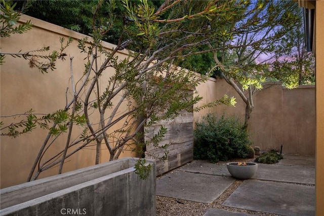 42 Cipresso, Irvine, CA 92618 - fenced backyard featuring a patio