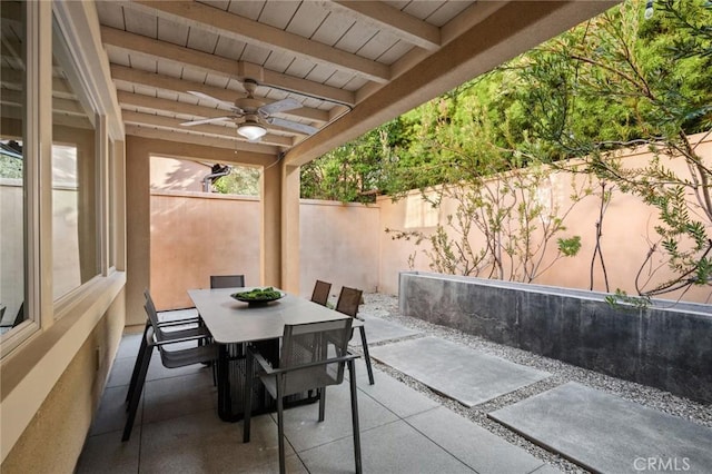 42 Cipresso, Irvine, CA 92618 - fenced backyard featuring a ceiling fan, outdoor dining area, and a patio