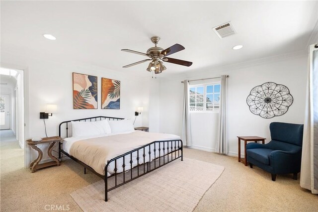 carpeted bedroom with ornamental molding, recessed lighting, ceiling fan, and visible vents