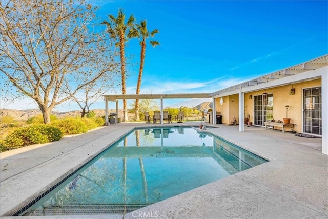 pool featuring a patio