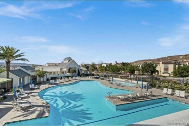 pool with a patio