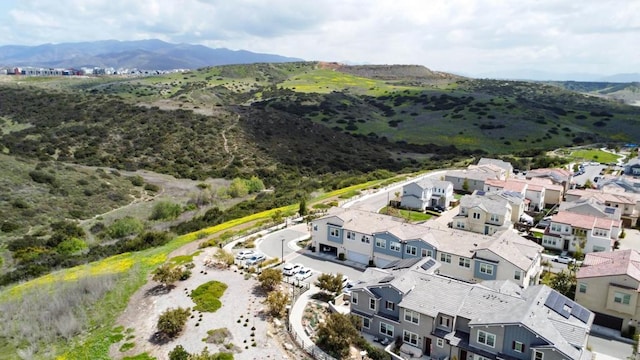 aerial view with a mountain view and a residential view