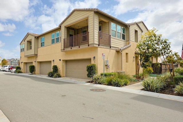 view of property featuring an attached garage