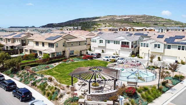 aerial view with a mountain view and a residential view