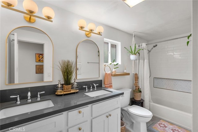full bathroom featuring a sink, toilet, double vanity, and shower / tub combo with curtain
