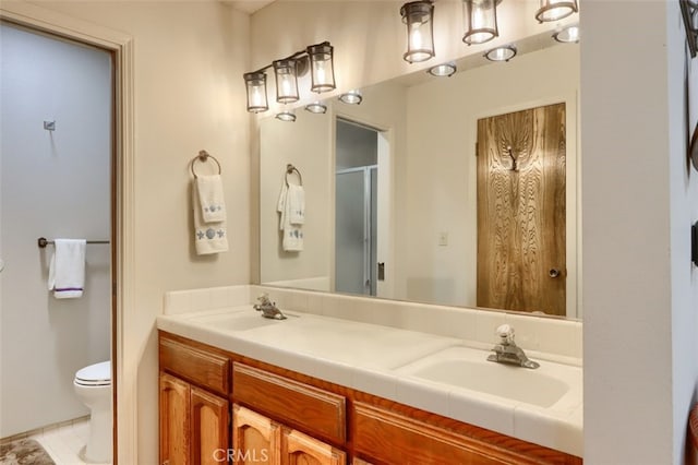 44410 Quail Ct, Coarsegold, CA 93614 - bathroom featuring a sink, an enclosed shower, toilet, and double vanity
