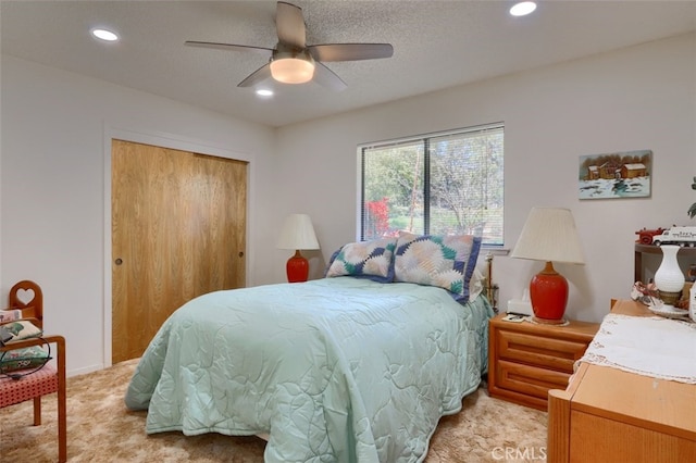 44410 Quail Ct, Coarsegold, CA 93614 - bedroom with ceiling fan, a textured ceiling, a closet, recessed lighting, and light carpet