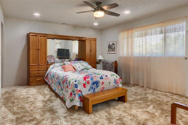 44410 Quail Ct, Coarsegold, CA 93614 - carpeted bedroom featuring a ceiling fan, visible vents, recessed lighting, and a textured ceiling