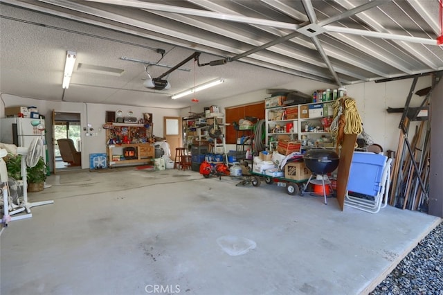 44410 Quail Ct, Coarsegold, CA 93614 - garage featuring a garage door opener