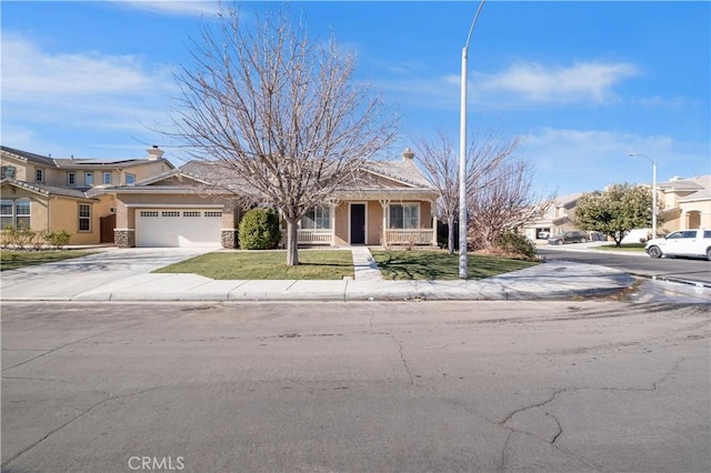 single story home featuring stucco siding, a front lawn, a chimney, a garage, and concrete driveway