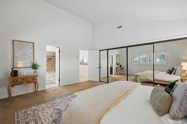 2707 Vanderbilt Ln Unit 1, Redondo Beach, CA 90278 - bedroom featuring carpet floors, high vaulted ceiling, and connected bathroom