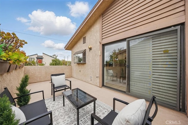 view of patio / terrace with fence